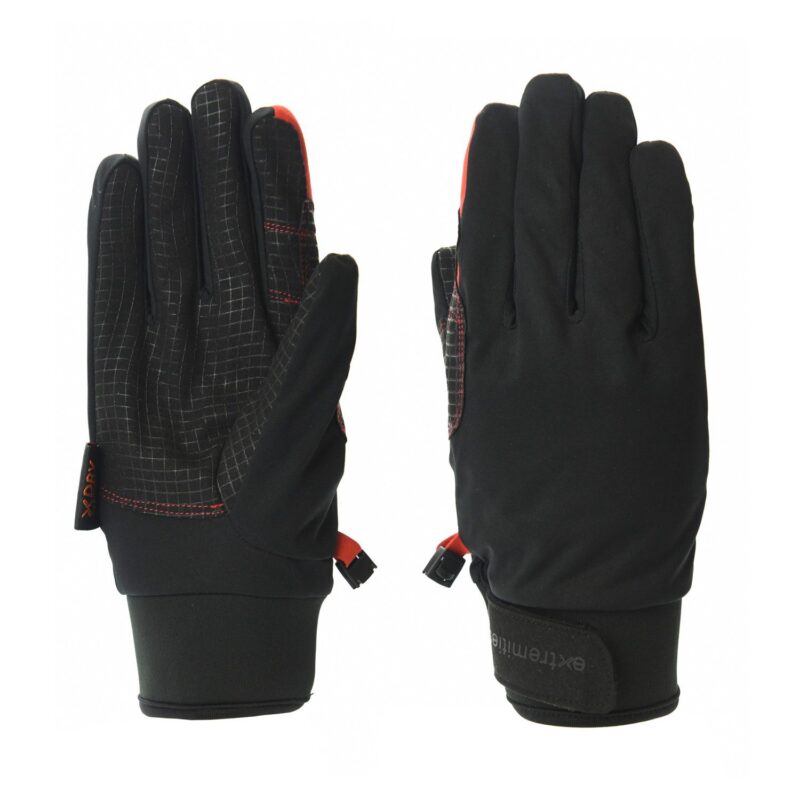Pair of black winter gloves laid flat—left glove palm-up showing a grey grid grip pattern, red stitching and a small red pull loop, right glove back-up with smooth black fabric and a Velcro wrist strap.