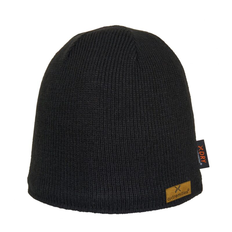 Black ribbed knit beanie with a rounded crown, a small tan leather brand patch sewn near the hem and a black fabric tag with orange XDRY lettering, shown on a white background.