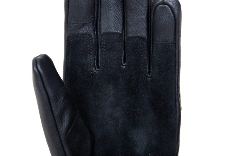 Close-up of a black glove showing a suede palm with leather-trimmed fingers and thumb and visible stitching.