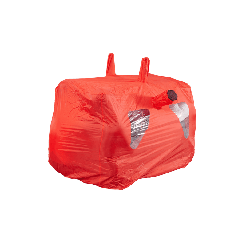 Red cuboid-shaped plastic cover with two upright loops on top, a short tubular nozzle at the front and two triangular clear windows revealing a silver interior, isolated on a white background