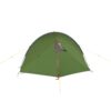 Green dome camping tent with grey trim and a red-zippered front panel, supported by crossed poles and yellow guy lines against a white background.
