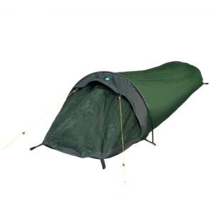 Green single-person bivvy tent with a tapered mummy shape and dark grey hood, showing a mesh front entrance, curved pole support and yellow guy lines.