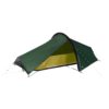 Dark green single-arch backpacking tent with a yellow inner sleeping area, black pole frame and taut guy lines, shown pitched on a white background.