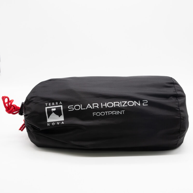 Black cylindrical stuff sack with a red drawstring, labelled 'Terra Nova Solar Horizon 2 Footprint' on the side.