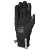 Black insulated glove shown palm-up with horizontal glossy grip strips across the palm, touchscreen-friendly reinforced tips on thumb and index finger, a reflective cuff tab and small red brand tag.