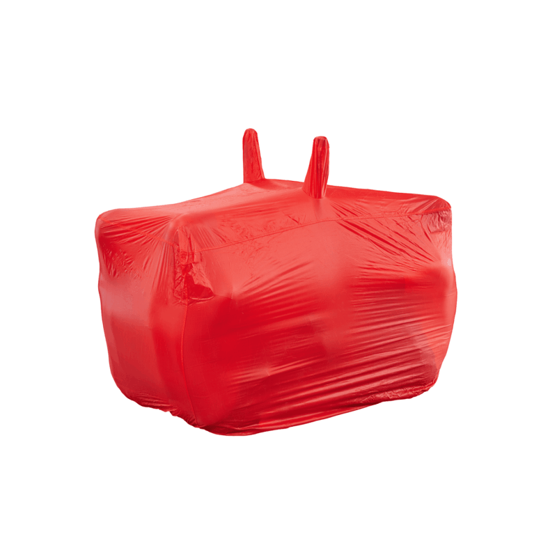 Large rectangular object tightly wrapped in bright red stretch plastic with two short vertical handles protruding from the top, shown against a plain white background.
