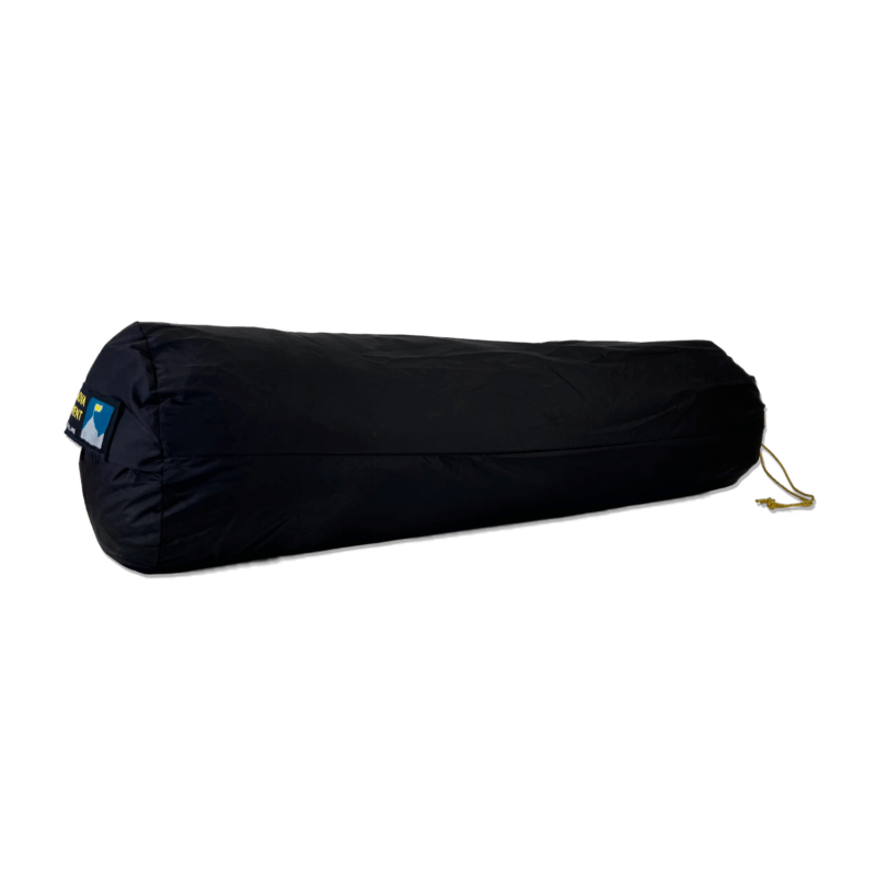 Long black cylindrical sleeping-bag stuff sack with a yellow drawcord and a small blue-and-yellow logo patch on the left, shown on a white background.