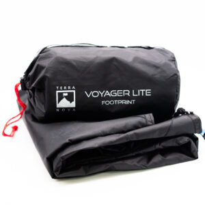 Folded black Terra Nova Voyager Lite footprint with its cylindrical stuff sack showing the white logo and text 'VOYAGER LITE FOOTPRINT' and a red drawcord at one end.
