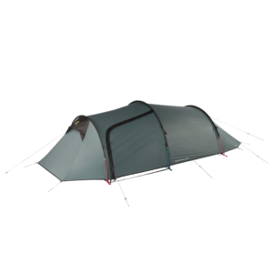 WC-Blizzard-Elite-3-CO4-3.webp Green-grey, low-profile three-person tunnel tent with arched poles, a front vestibule and a zippered side door, secured with red and blue guy lines on a plain background.