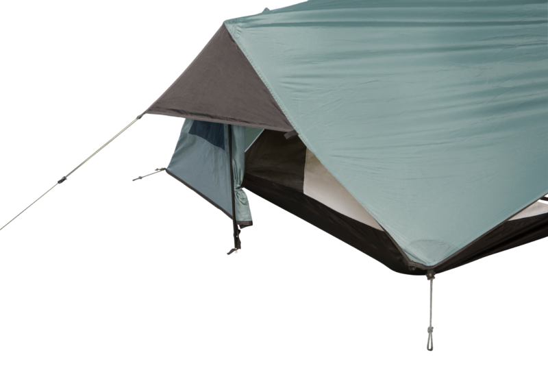 Close-up of the corner of a pale teal camping tent showing the rainfly and taut guyline, a partially open inner doorway tied back and the black bathtub floor beneath.