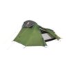 Green two-person tent with a grey rainfly, yellow guy lines and blue and red pole accents, one side open to reveal the inner mesh and grey groundsheet against a plain white background