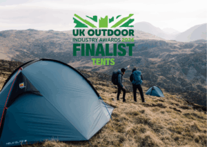 Two hikers setting up tents in a mountainous landscape, showcasing outdoor gear. Image features the UK Outdoor Industry Awards 2024 Finalist logo for tents, emphasizing quality and innovation in camping equipment.